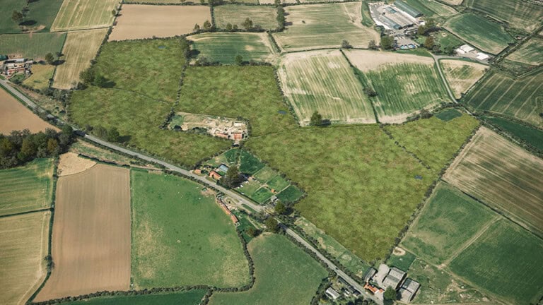 Birds-eye render of Heighington Habitat Bank with habitats restored, including rich grassland and ponds