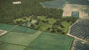 Birds-eye render of Minting Habitat Bank with habitats restored, including new ponds, scrub, grassland, and broadleaved woodland