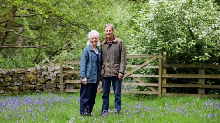 Landowners Rupert and Fiona Arnold, a married couple in their sixties, stood amongst wildflowers at the Harrogate Habitat Bank