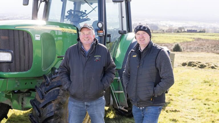 Farmers John and Richard Pendlebury, father in his sixties and son in his forties, stood at the Horwich Habitat Bank beside a large green tractor