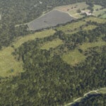 Birds-eye render of Ardingly Habitat Bank with habitats restored, including new meadows, native hedgerow, ditches, woodland, scrub, and ponds