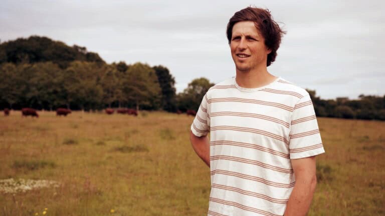 Landowner Toby Diggens, a man in his thirties wearing a striped red and white t-shirt