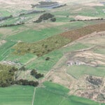 Birds-eye render of Newhey Habitat Bank with habitats restored, including new fens, meadows, ponds, trees, scrub, and grassland