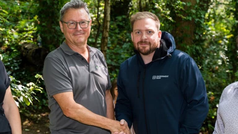 Jon Davies from RSK Wilding shaking hands with Environment Bank ecologist
