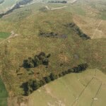 Birds-eye render of Keighley Habitat Bank with habitats restored, including new meadows, fens, ponds, scrub, grassland, and woodland