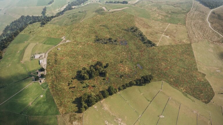Birds-eye render of Keighley Habitat Bank with habitats restored, including new meadows, fens, ponds, scrub, grassland, and woodland