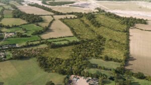 Birds-eye render of Dunstable Habitat Bank with habitats restored, including new meadows, scrub, and orchards