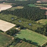 Birds-eye render of Coney Weston Habitat Bank with habitats restored, including new meadows, scrub, ponds, hedgerows, trees, and grassland.