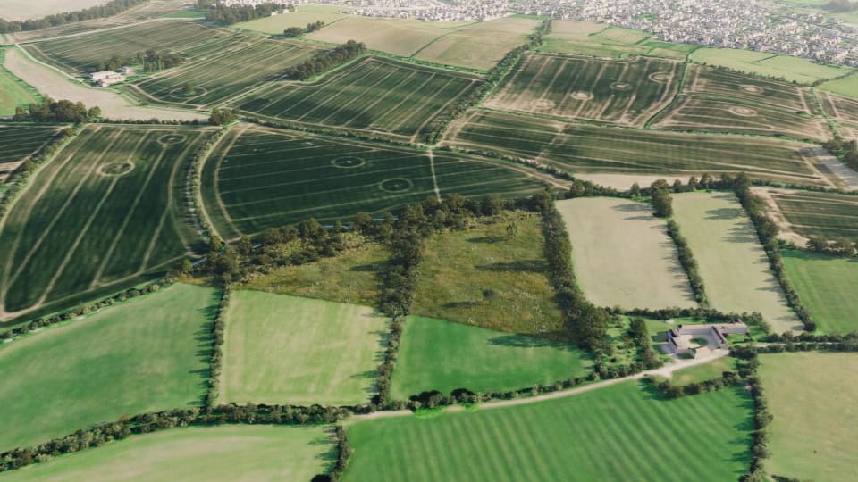 Birds-eye render of Cramlington Habitat Bank with habitats restored, including hedgerows, scrub, grassland, and trees.