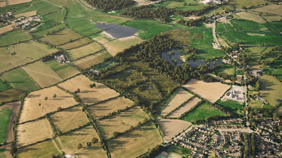 Birds-eye render of Ellesmere Port Habitat Bank with habitats restored, including meadows, orchard, ponds, ditches, mixed scrub, willow scrub, neutral grassland, floodplain wetland mosaic and coastal floodplain grazing marsh