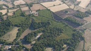 Birds-eye render of Hastingleigh Habitat Bank with habitats restored, including meadows, lowland calcareous grassland, mixed scrub, and species-rich native hedgerow with trees
