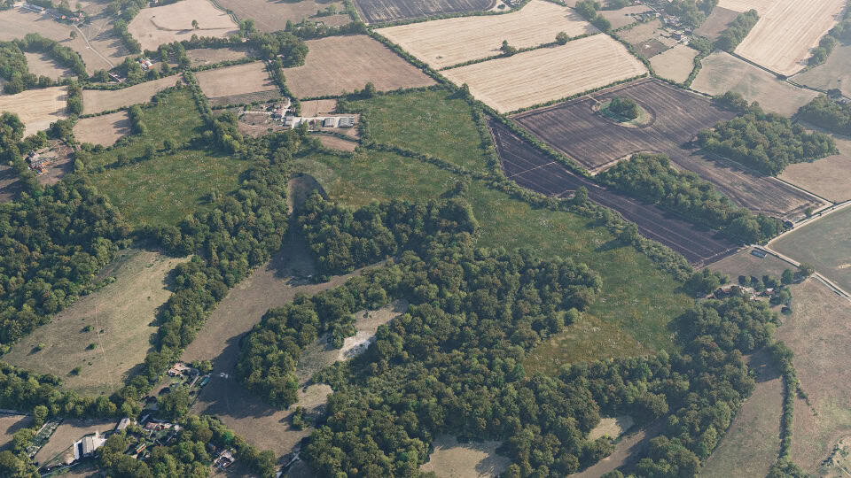 Birds-eye render of Hastingleigh Habitat Bank with habitats restored, including meadows, lowland calcareous grassland, mixed scrub, and species-rich native hedgerow with trees
