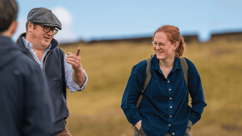 Will (left) speaking to Environment Bank's Commercial Asset Manager Lauren (right) at Keighley Habitat Bank.