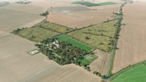 Birds-eye render of Tiptree Habitat Bank with habitats restored, including lowland calcareous grassland, rivers and streams, native hedgerow with trees, traditional orchards, ditches, and scrub